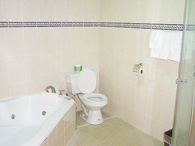 Jr. Suites - Upper Level Jr. Suites - Upper Level - Charela Jr. Suite Bath - Negril Resorts and Hotels, Jamaica