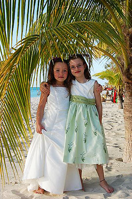 Charela Flower Girls Standing On Beach