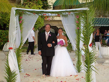 Charela Wedding Beach Under A Canopy.JPG