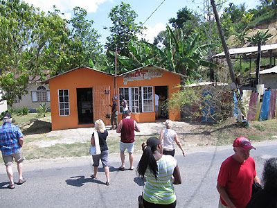 Tourists Stop At Local Shops At Orange Bay